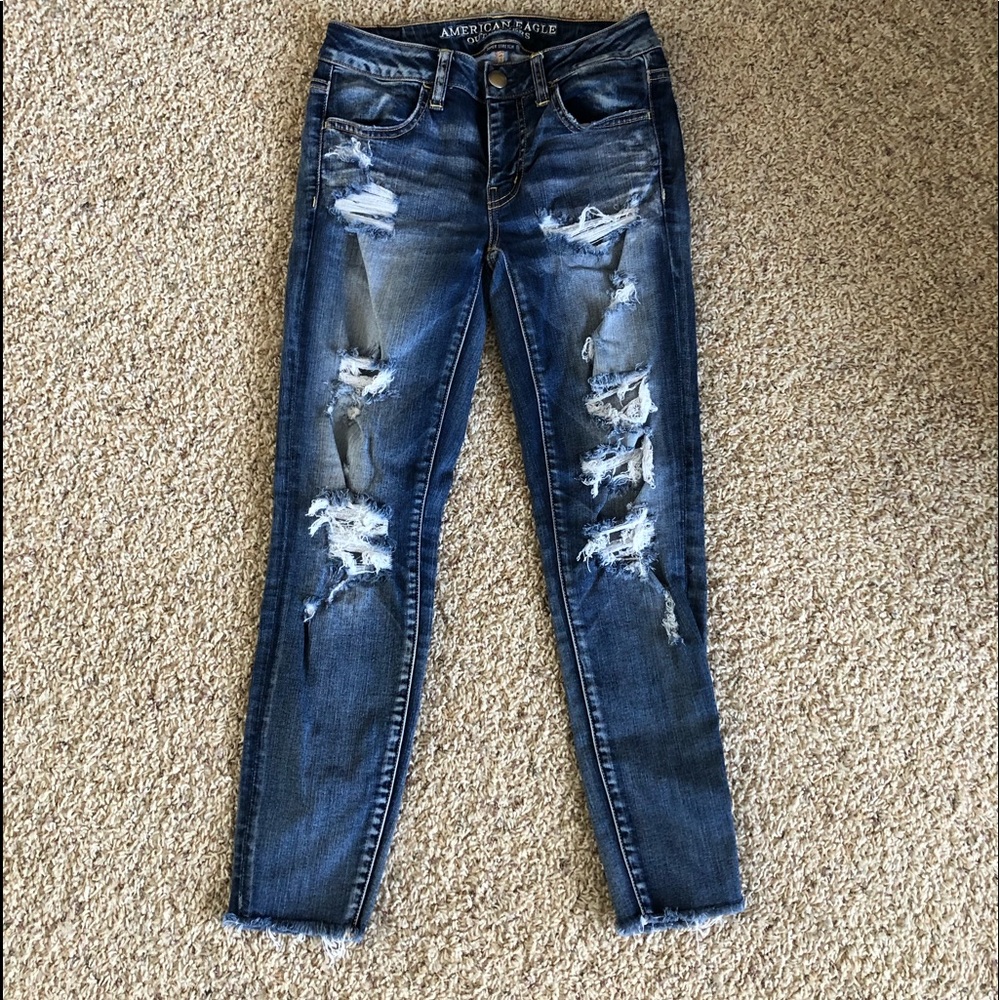 cropped ripped dark wash jeans